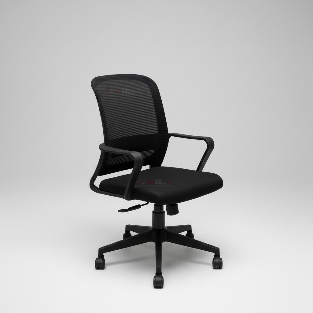 Black office chair in a modern office setting with a desk and plant.