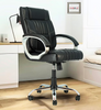 Black office chair with chrome base in a room setting, featuring the Classela logo.